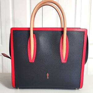 Christian Louboutin black and tan handbag.